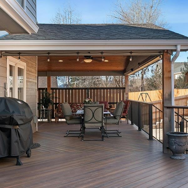exterior home with deck and covered porch