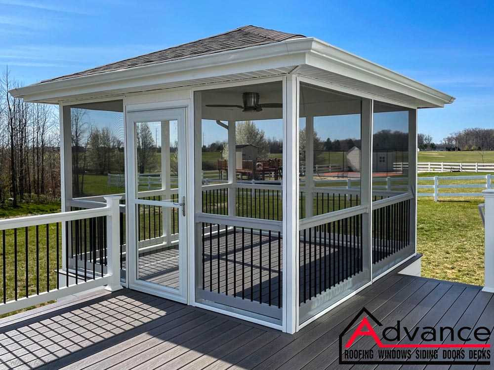 Covered outdoor space completed with shingle roofing service in Newark, DE.