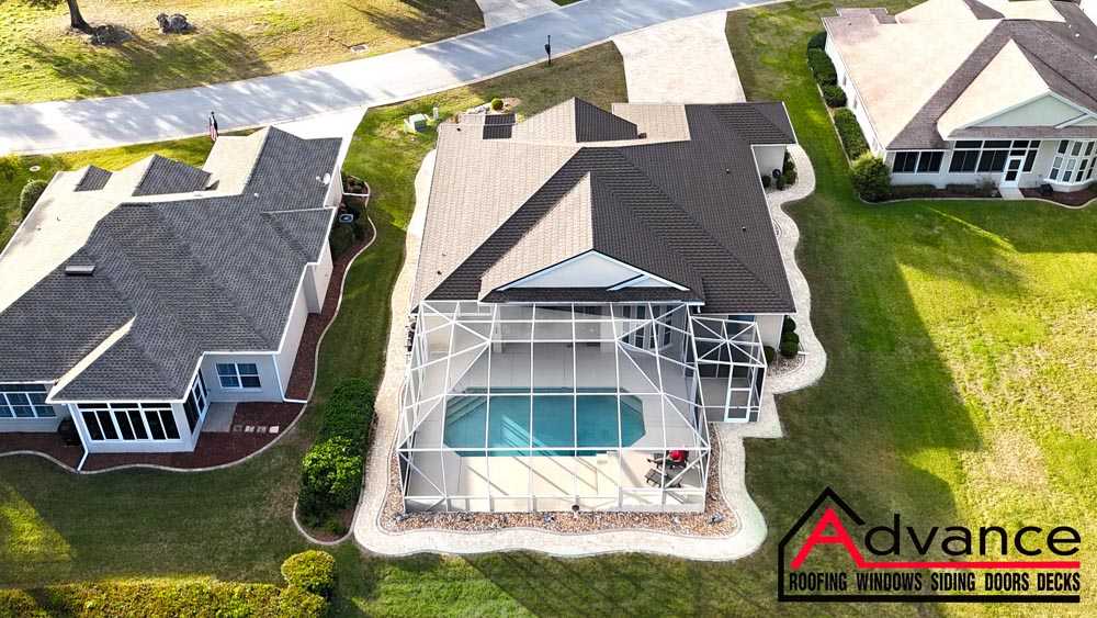 House with screened pool enclosure and new shingle roofing in Newark, DE.