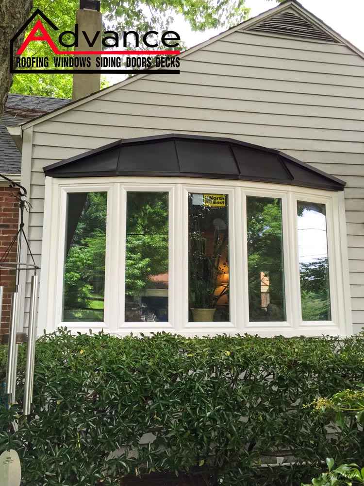 A modern bay window was added to the home exterior for window installation in Newark, DE.